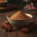 Premium star anise powder in ceramic bowl with whole star anise pods
